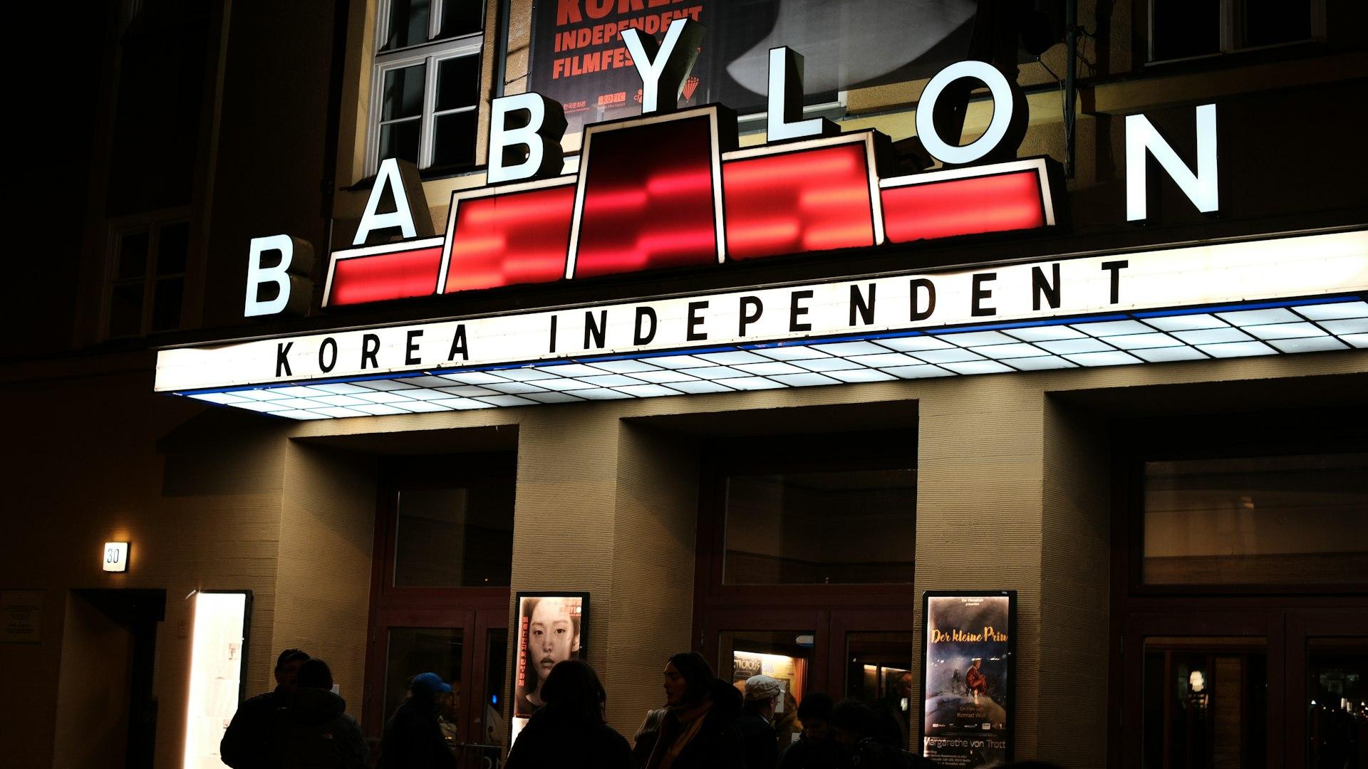 The Indy marquee lit up outside on a winter night